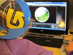 kid playing a computer